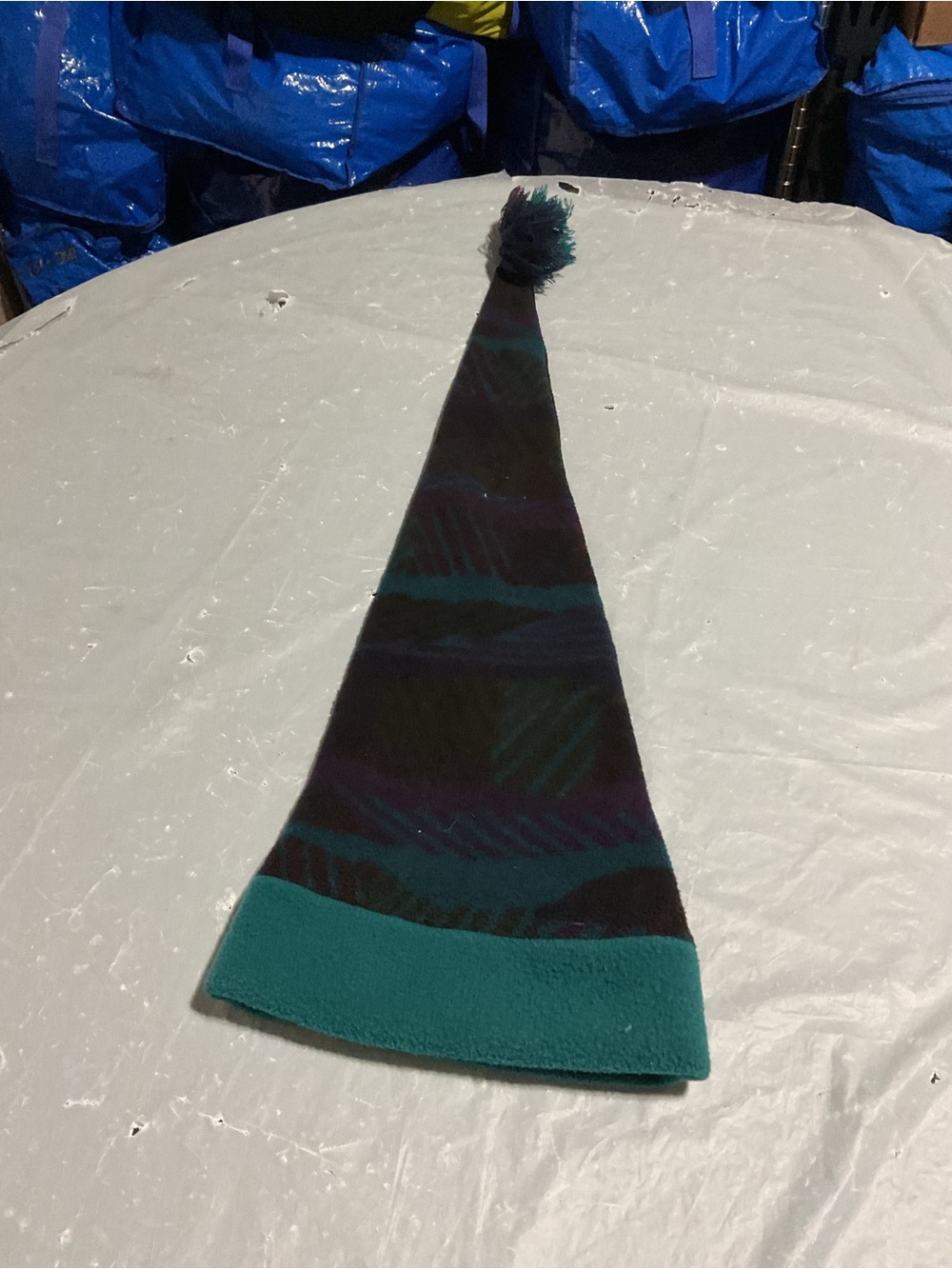 Long Pointed Pom-Pom Winter Hat in Teal & Black
